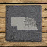 Nebraska square slate coaster engraved with the state shape in ornate floral scrollwork