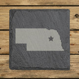 Nebraska square slate coaster engraved with the state shape and a star