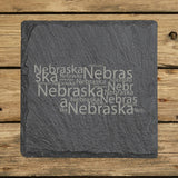 Nebraska square slate coaster engraved with a word cloud of repeating Nebraska text