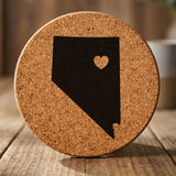 Nevada round cork coaster engraved with the state shape and a heart