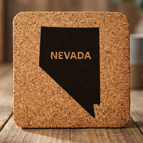 Nevada square cork coaster engraved with the state shape and NEVADA in bold lettering