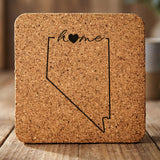 Nevada square cork coaster engraved with the state outline and home in script with a heart