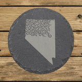 Nevada round slate coaster engraved with the state shape in ornate floral scrollwork
