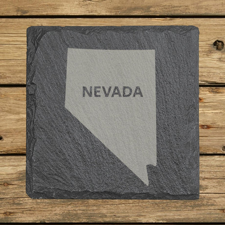 Nevada square slate coaster engraved with the state shape and NEVADA in bold lettering