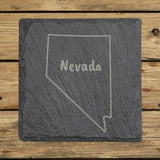 Nevada square slate coaster engraved with the state outline and NEVADA in hand-drawn brush lettering