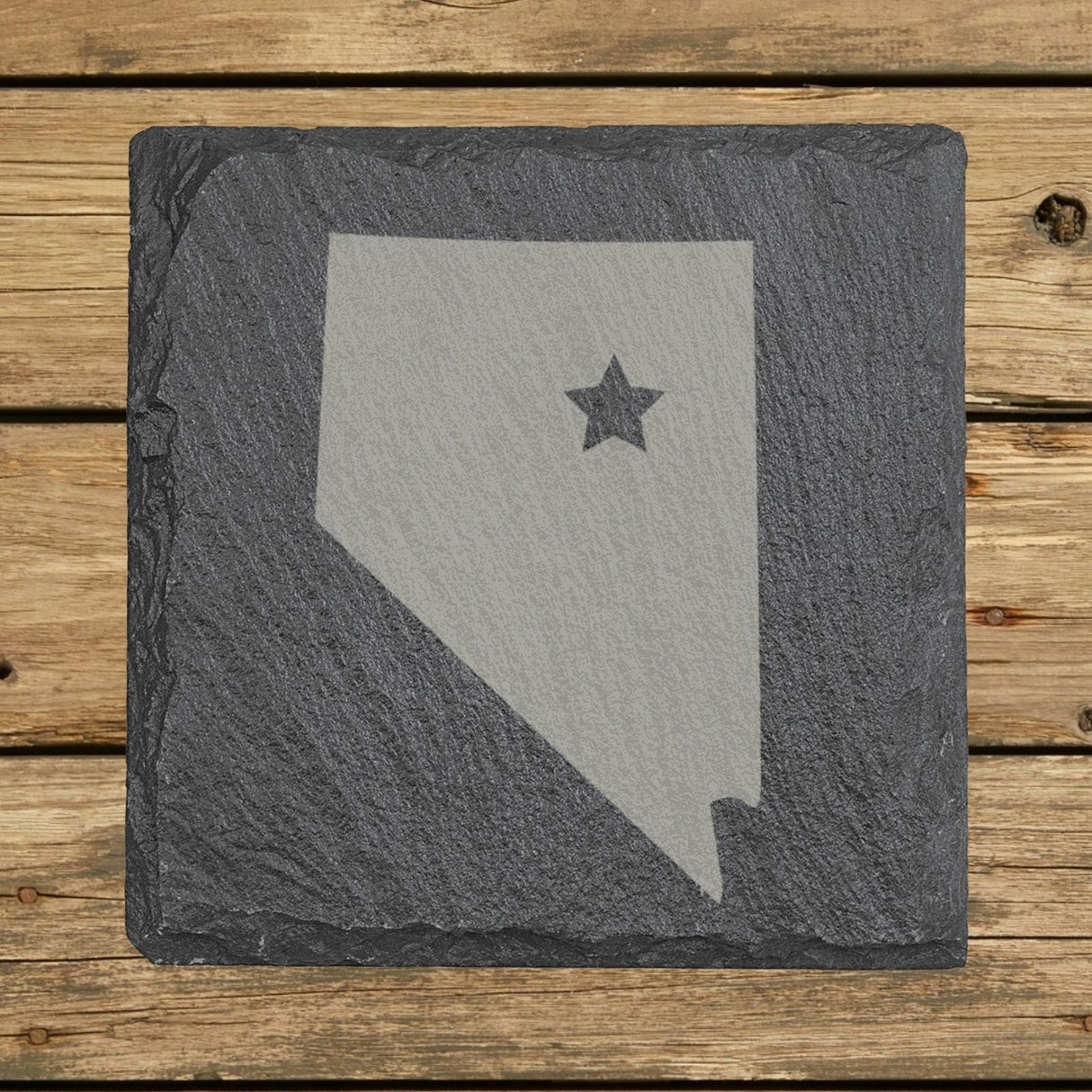 Nevada square slate coaster engraved with the state shape and a star