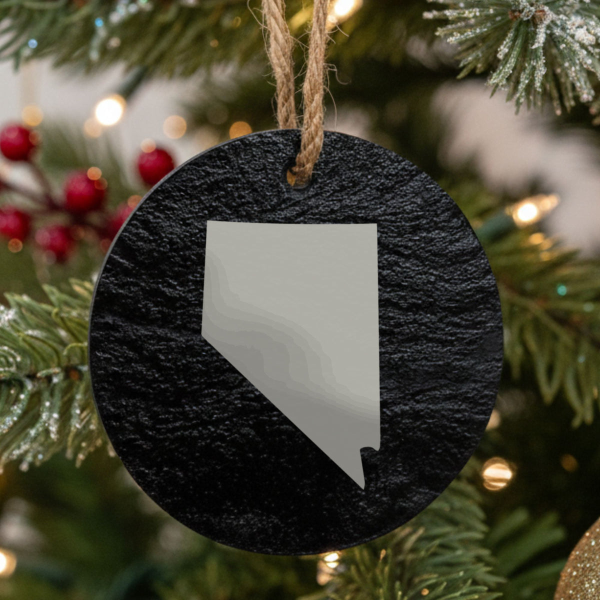 Nevada round slate Christmas ornament with the full state shape engraved