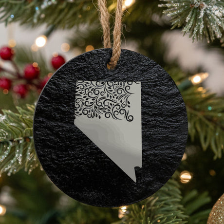 Nevada round slate Christmas ornament engraved with the state shape in ornate floral scrollwork