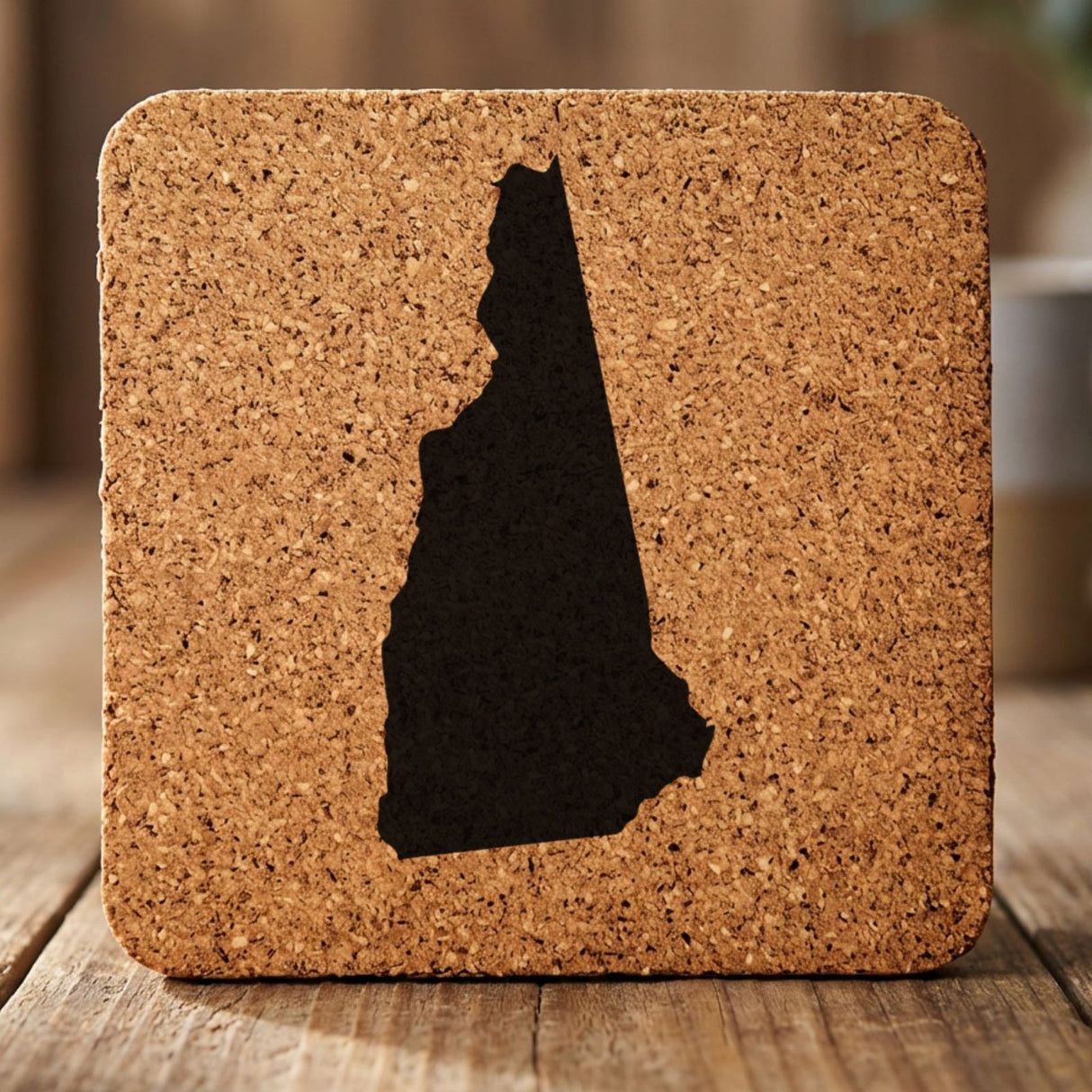 New Hampshire square cork coaster with the full state shape engraved