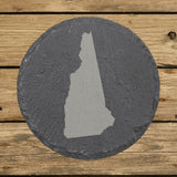New Hampshire round slate coaster with the full state shape engraved