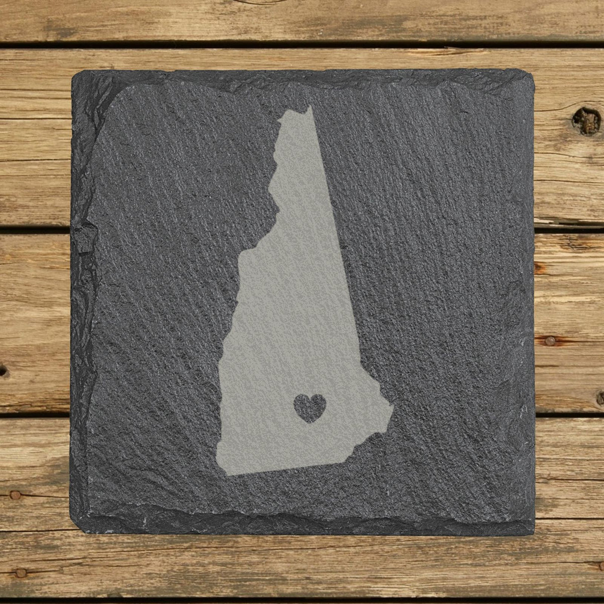 New Hampshire square slate coaster engraved with the state shape and a heart