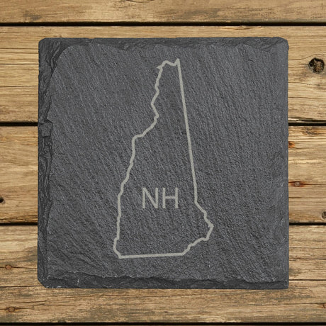 New Hampshire square slate coaster engraved with the state outline and NH initials