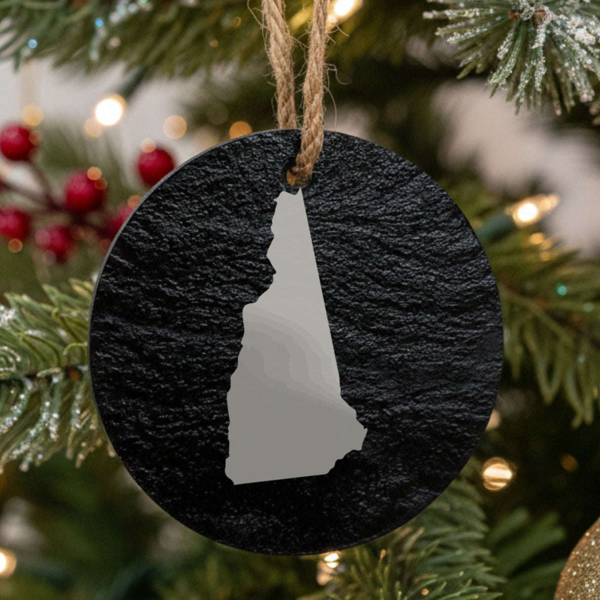 New Hampshire round slate Christmas ornament with the full state shape engraved