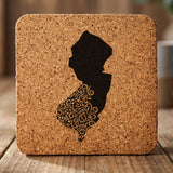 New Jersey square cork coaster engraved with the state shape in ornate floral scrollwork