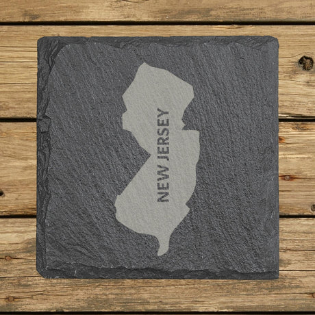 New Jersey square slate coaster with the engraved state shape and NEW JERSEY running vertically