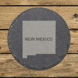New Mexico round slate coaster engraved with the state shape and NEW MEXICO in bold lettering