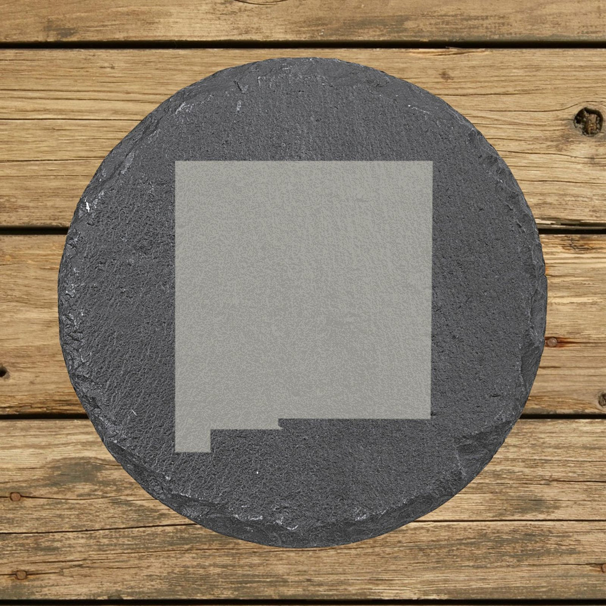New Mexico round slate coaster with the full state shape engraved