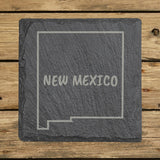 New Mexico square slate coaster engraved with the state outline and NEW MEXICO in hand-drawn brush lettering