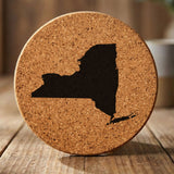New York round cork coaster with the full state shape engraved