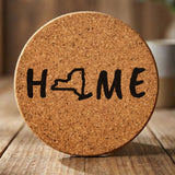 New York round cork coaster engraved with HOME using the state outline as the letter O