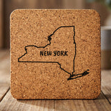 New York square cork coaster engraved with the state outline and NEW YORK in hand-drawn brush lettering