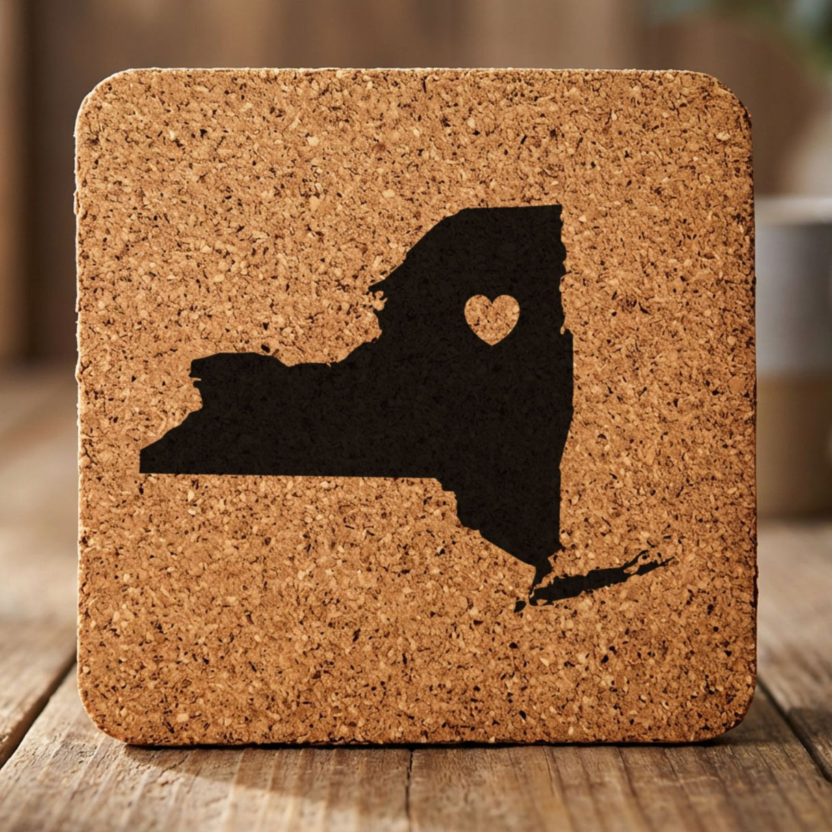 New York square cork coaster engraved with the state shape and a heart