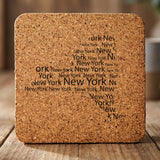 New York square cork coaster engraved with a word cloud of repeating New York text