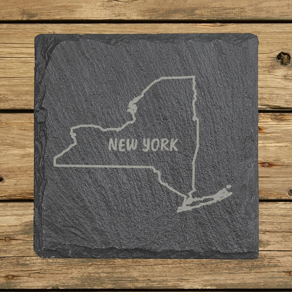 New York square slate coaster engraved with the state outline and NEW YORK in hand-drawn brush lettering