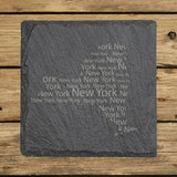 New York square slate coaster engraved with a word cloud of repeating New York text