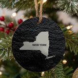 New York round slate Christmas ornament engraved with the state shape and NEW YORK in bold lettering