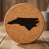 North Carolina round cork coaster with the full state shape engraved
