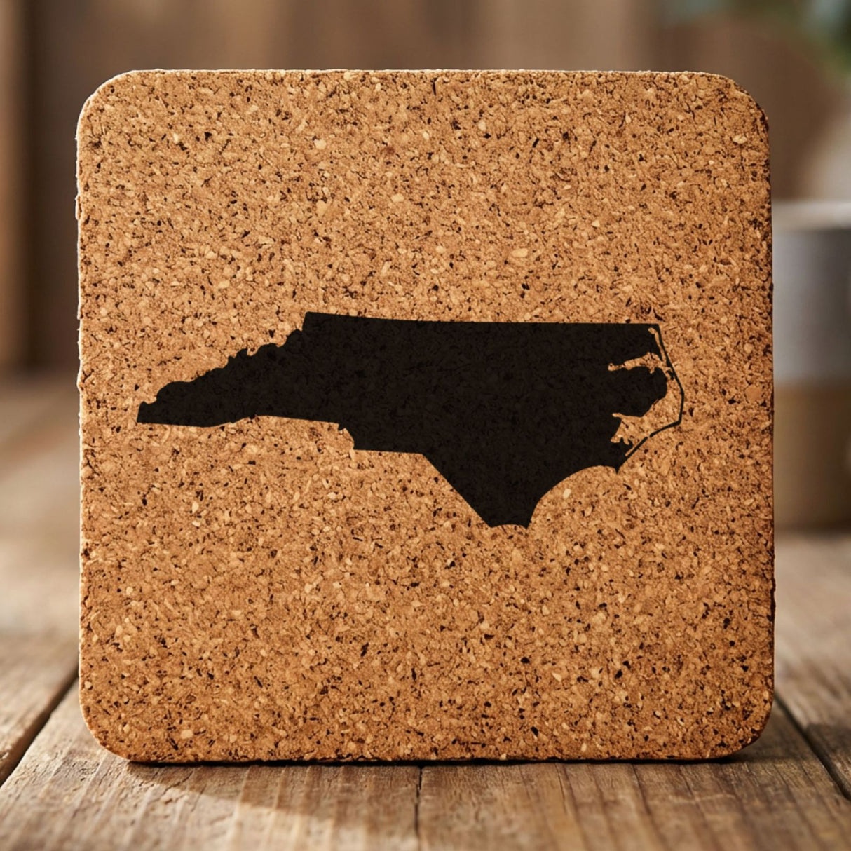 North Carolina square cork coaster with the full state shape engraved