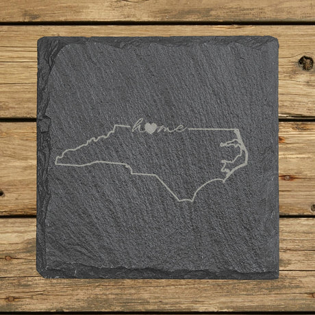 North Carolina square slate coaster engraved with the state outline and home in script with a heart