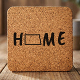 North Dakota square cork coaster engraved with HOME using the state outline as the letter O