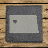 North Dakota square slate coaster engraved with the state shape and a heart