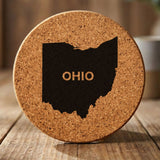 Ohio round cork coaster engraved with the state shape and OHIO in bold lettering
