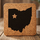 Ohio square cork coaster engraved with the state shape and a star