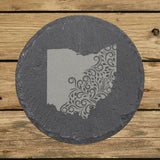 Ohio round slate coaster engraved with the state shape in ornate floral scrollwork
