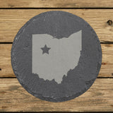Ohio round slate coaster engraved with the state shape and a star