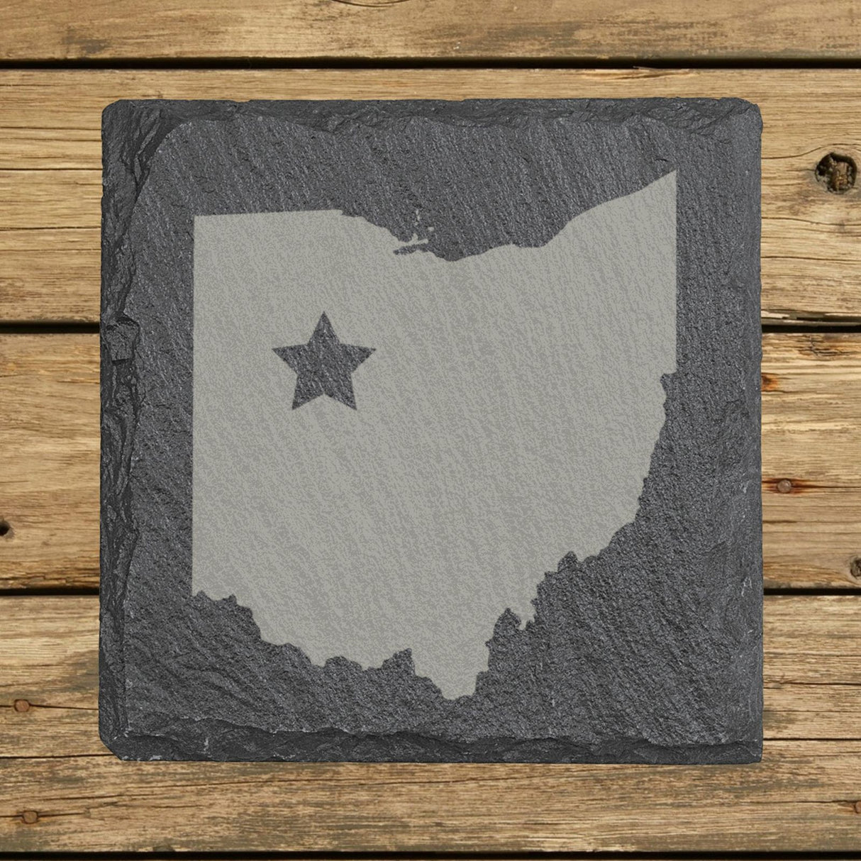 Ohio square slate coaster engraved with the state shape and a star