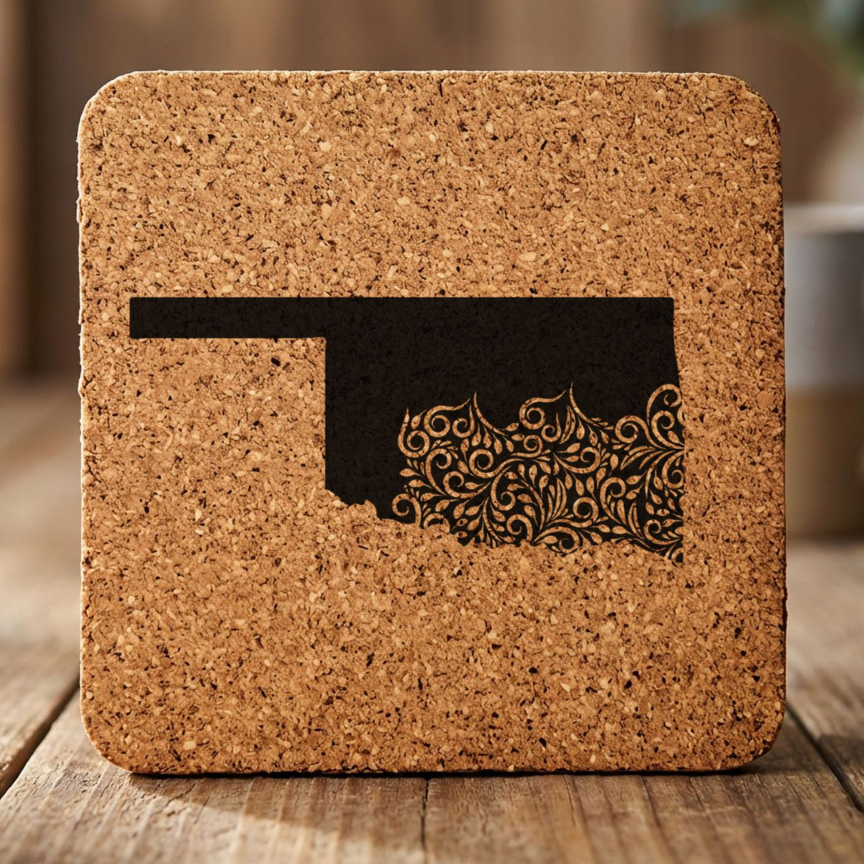Oklahoma square cork coaster engraved with the state shape in ornate floral scrollwork