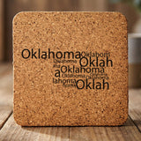 Oklahoma square cork coaster engraved with a word cloud of repeating Oklahoma text