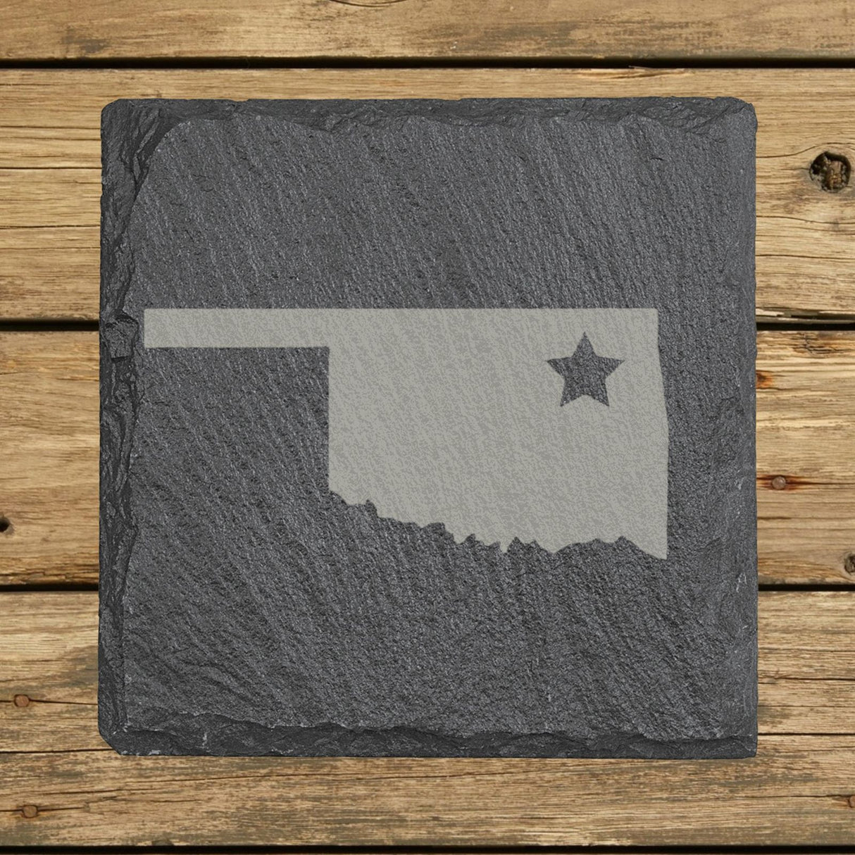 Oklahoma square slate coaster engraved with the state shape and a star