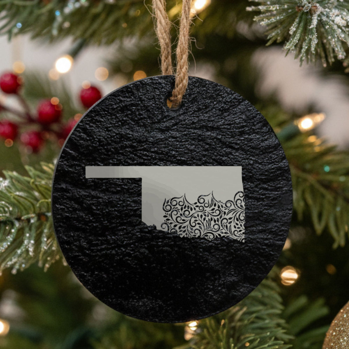 Oklahoma round slate Christmas ornament engraved with the state shape in ornate floral scrollwork