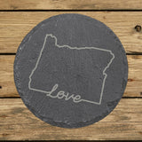 Oregon round slate coaster engraved with a hand-drawn state outline and love in cursive
