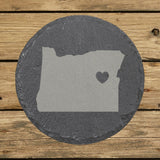 Oregon round slate coaster engraved with the state shape and a heart