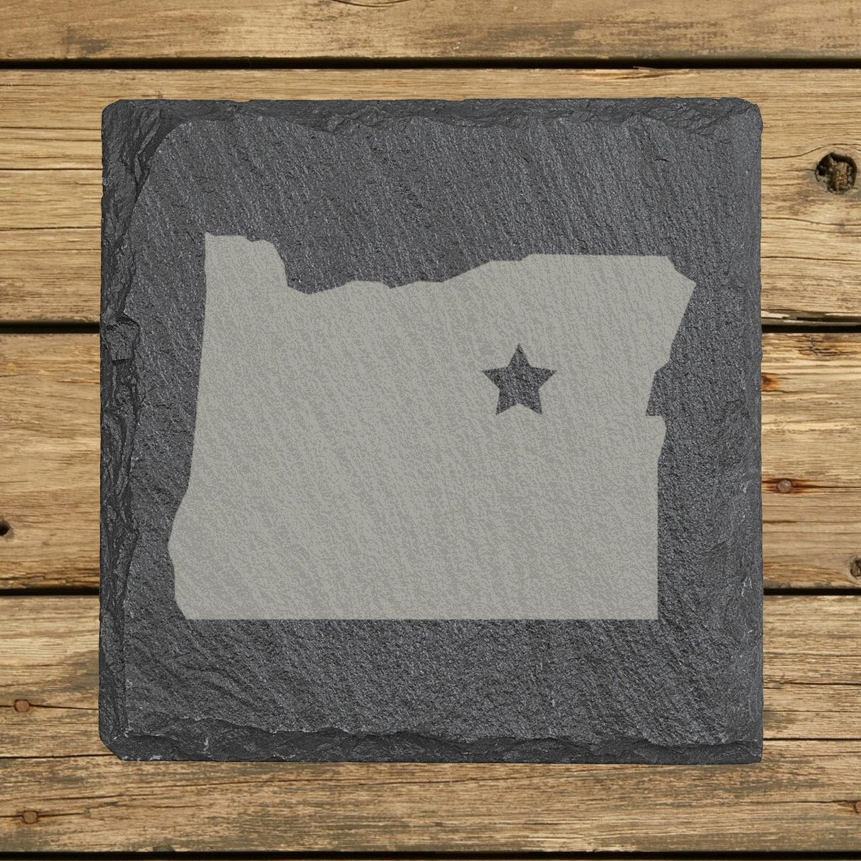 Oregon square slate coaster engraved with the state shape and a star