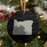 Oregon round slate Christmas ornament engraved with the state shape in ornate floral scrollwork