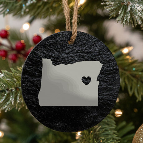 Oregon round slate Christmas ornament engraved with the state shape and a heart