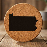Pennsylvania round cork coaster with the full state shape engraved